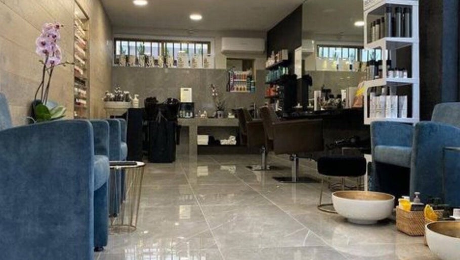 Modern interior of Pascale B Beauty Lab in Limassol, Limassol, CY featuring plush seating and elegant decor.