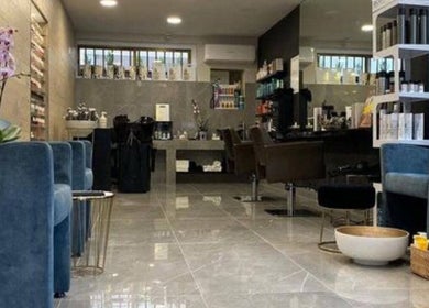 Modern interior of Pascale B Beauty Lab in Limassol, Limassol, CY featuring plush seating and elegant decor.