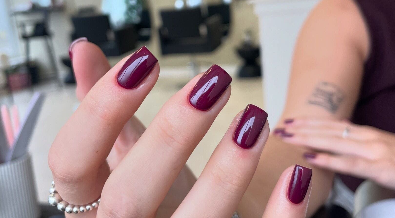 Glossy maroon nails manicure at Nails by Charlotte Goulding, North Shields, England, GB.