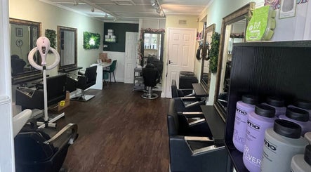 Hair by Faye salon interior in Colchester, England, GB, featuring stylish stations and modern decor.