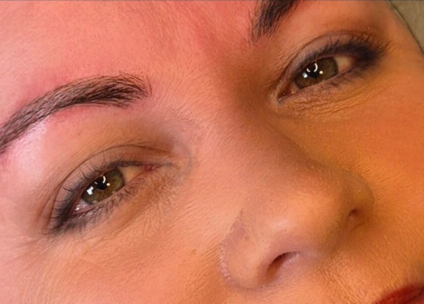 Detailed close-up of eyebrows after treatment at Atelier Beauty and Permanent Make-Up, Newcastle, New South Wales, AU.