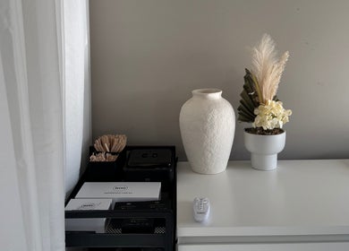 Elegant decor at Calista Bell Beauty, Melbourne, Victoria, AU featuring vases and natural elements.