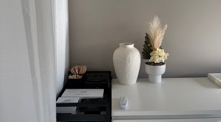 Elegant decor at Calista Bell Beauty, Melbourne, Victoria, AU featuring vases and natural elements.