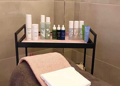 Glow it spa products and towels in relaxing room at Limenas Chersonisou, GR.