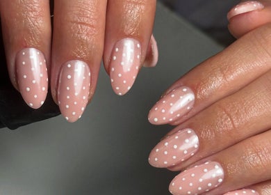 Polished nails with white polka dots at Salon 17, Tamworth, England, GB.