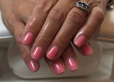Elegant pink gel nails at Nails By Tilly Louise in Chichester, England. Stunning salon manicure.