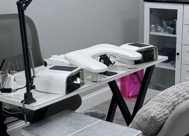 Manicure station at Julia Batalova Russian manicure in New York, New York, US with tools and UV lamp.