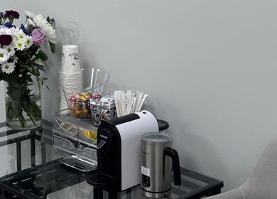 Coffee station with flowers at Julia Batalova Russian manicure, New York, New York, US.