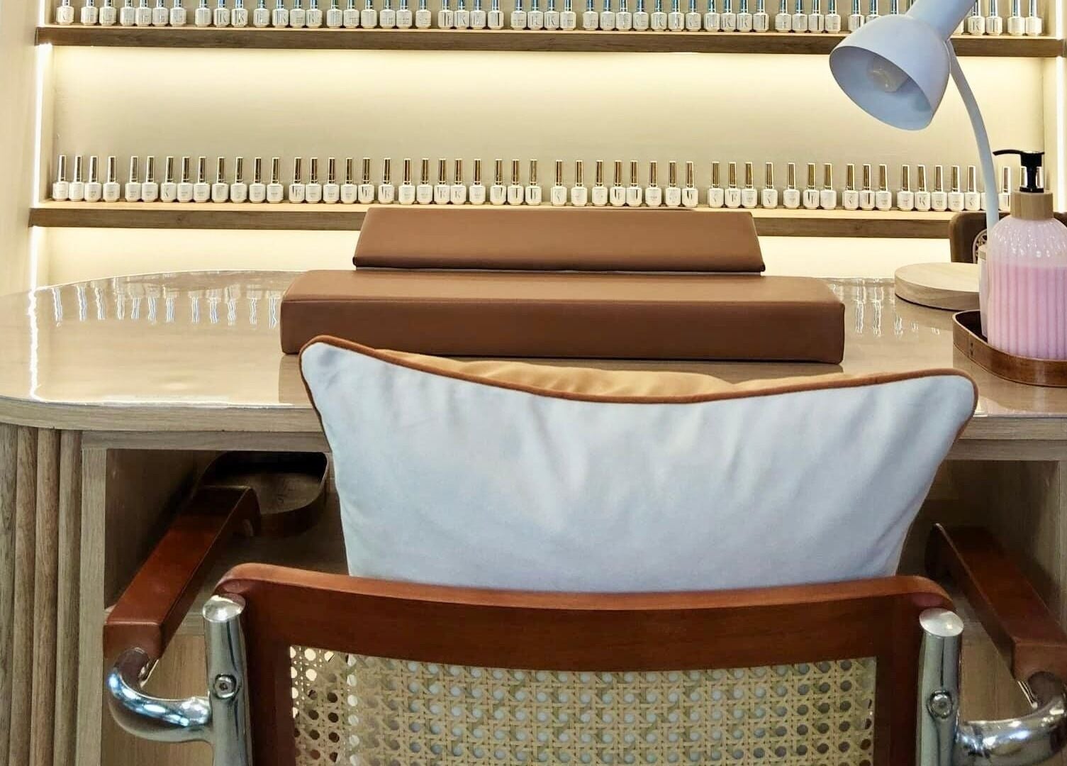 Elegant nail station with polish display at SugaNails KL, Ampang, Selangor, MY.