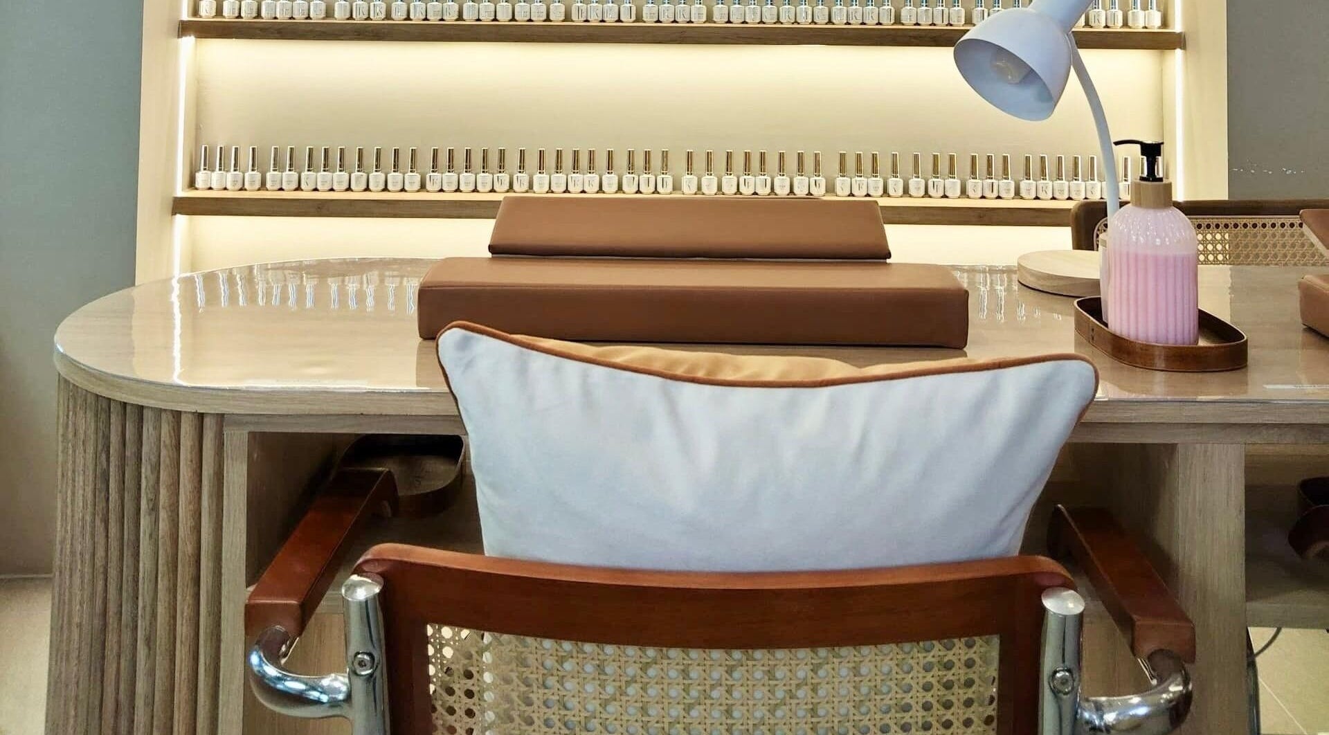 Elegant nail station with polish display at SugaNails KL, Ampang, Selangor, MY.