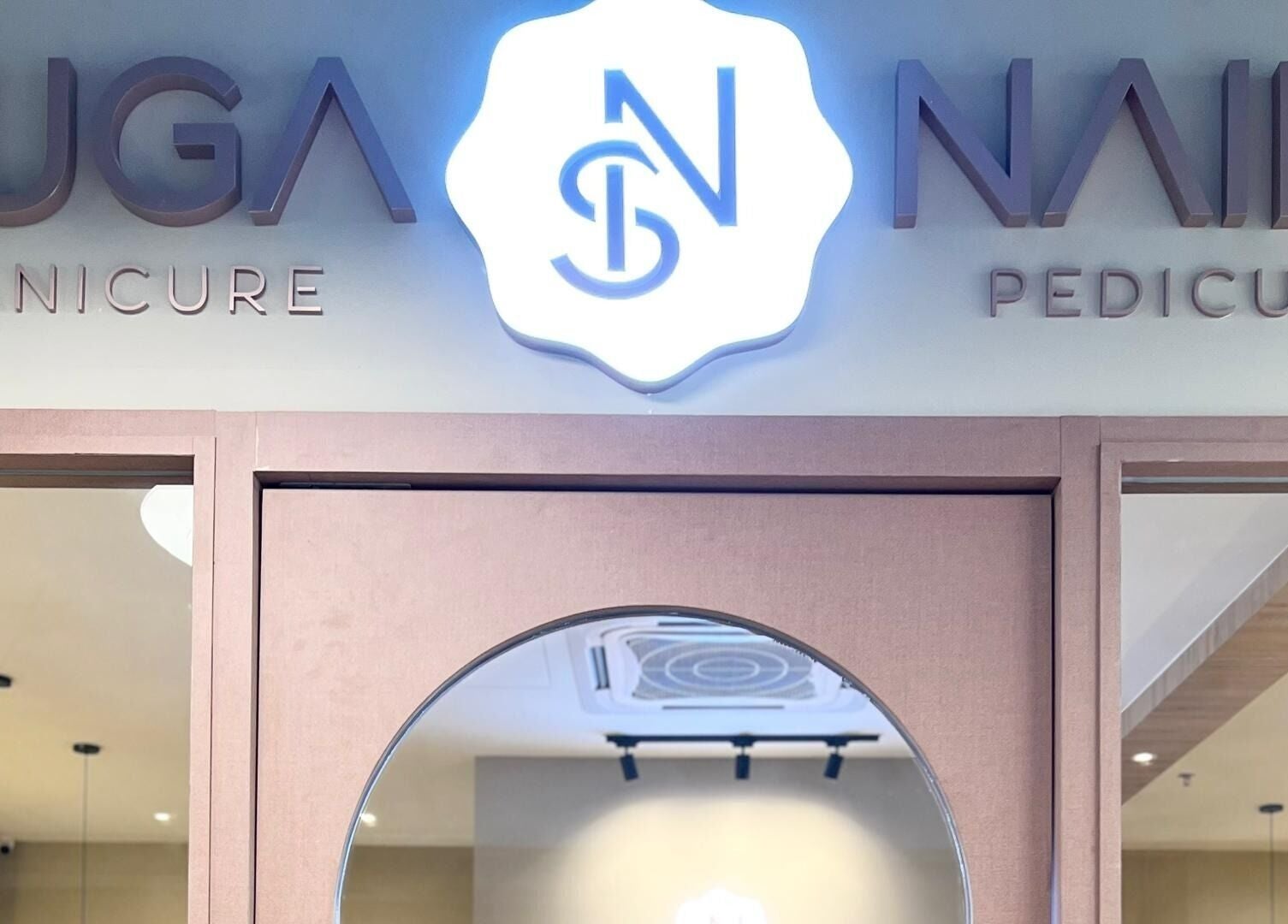 Entrance of SugaNails KL, a stylish salon in Ampang, Selangor, MY offering manicure and pedicure services.