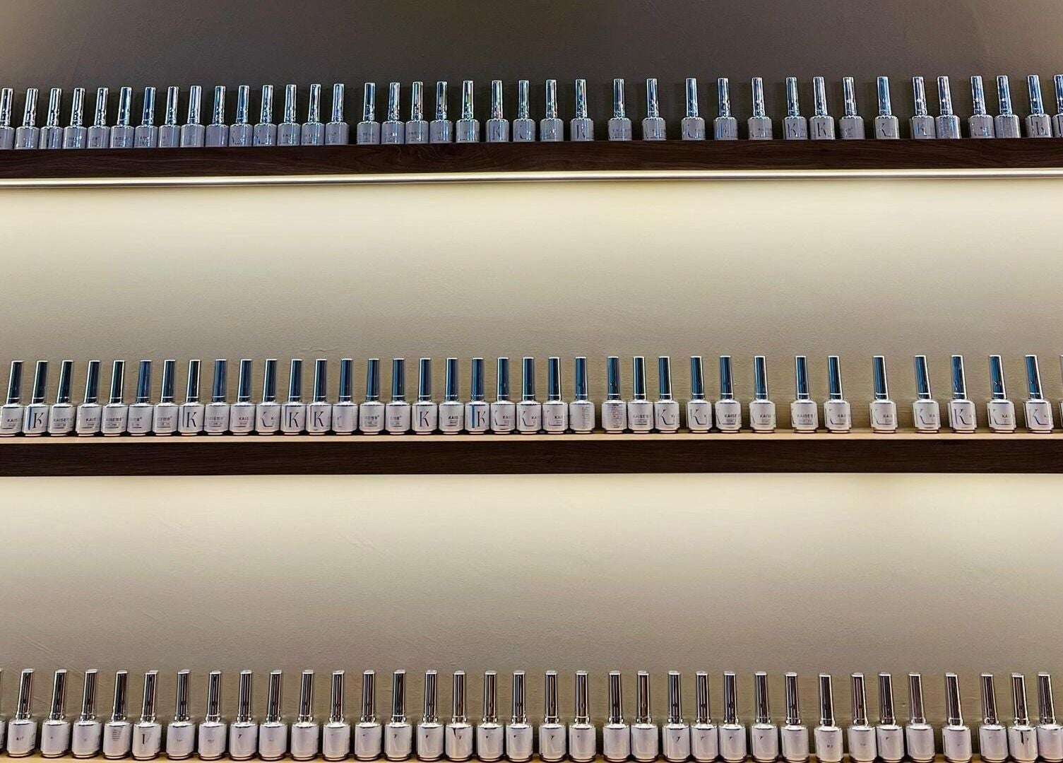 Elegant nail polish collection at SugaNails KL, Ampang, Selangor, MY. Neatly organized for customers.