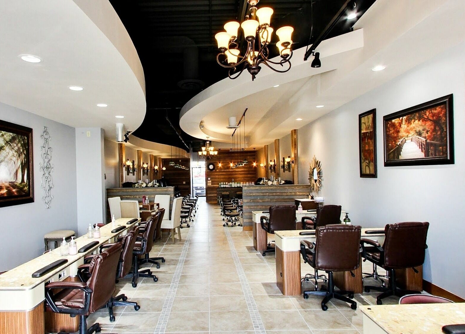 Interior of Natural Nail Bar in Appleton, Wisconsin, US, showcasing elegant manicure stations and stylish decor.