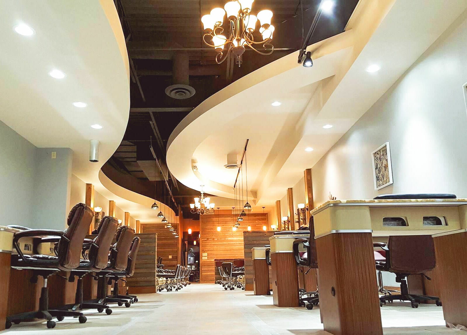 Stylish interior of Natural Nail Bar in Appleton, Wisconsin, US featuring modern nail stations and chic decor.