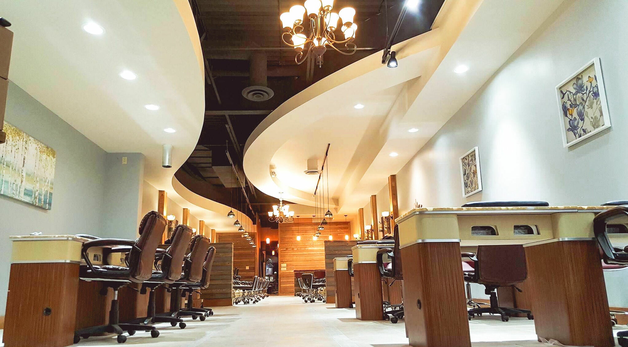 Stylish interior of Natural Nail Bar in Appleton, Wisconsin, US featuring modern nail stations and chic decor.