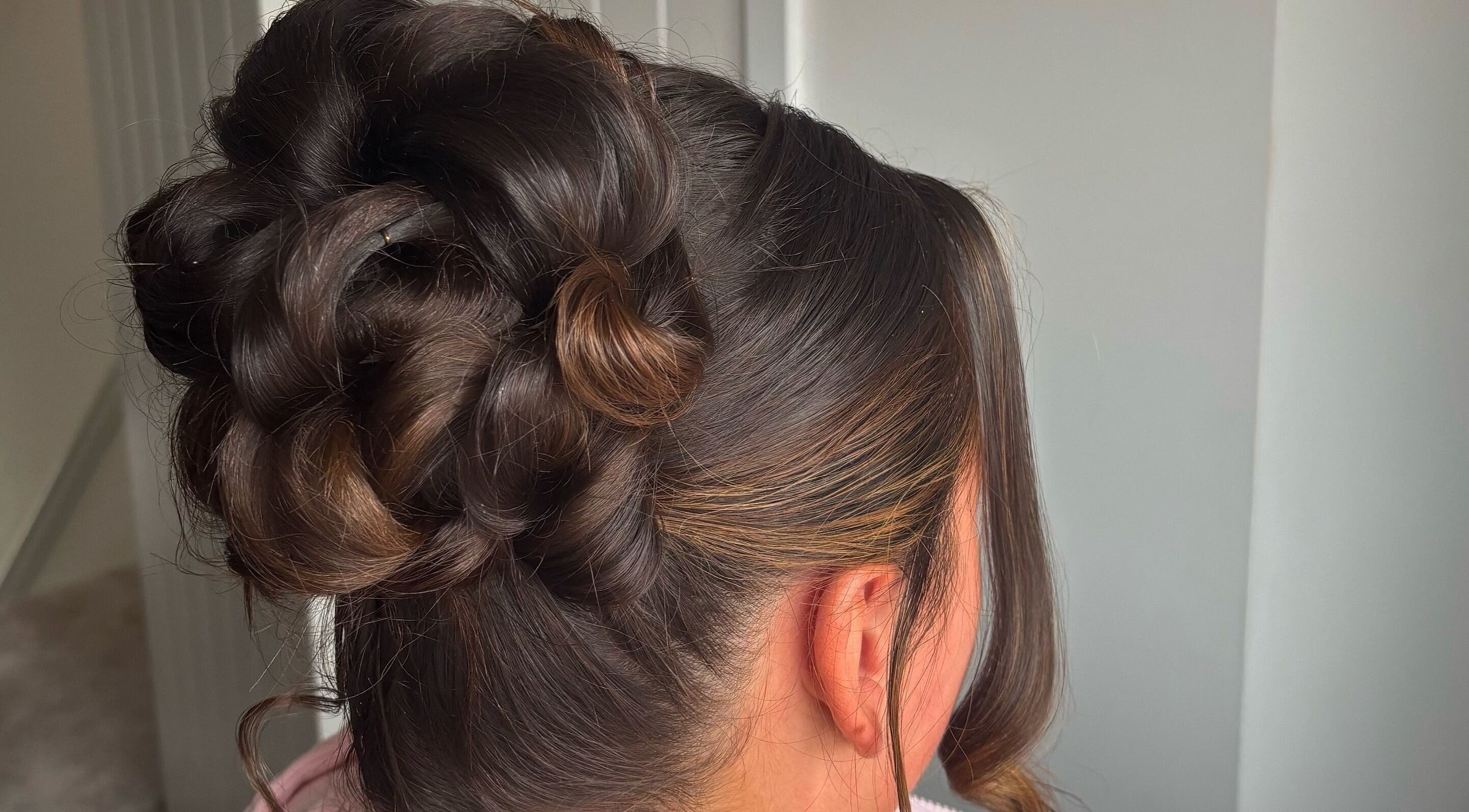 Sophisticated updo hairstyle at Revamp Studios, Ashington, England, GB.