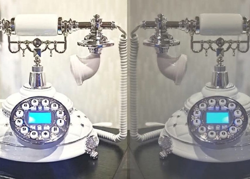 Decorative vintage phone at Mirror Mirror, Worcester, England, GB, enhancing the venue's sophisticated ambiance.