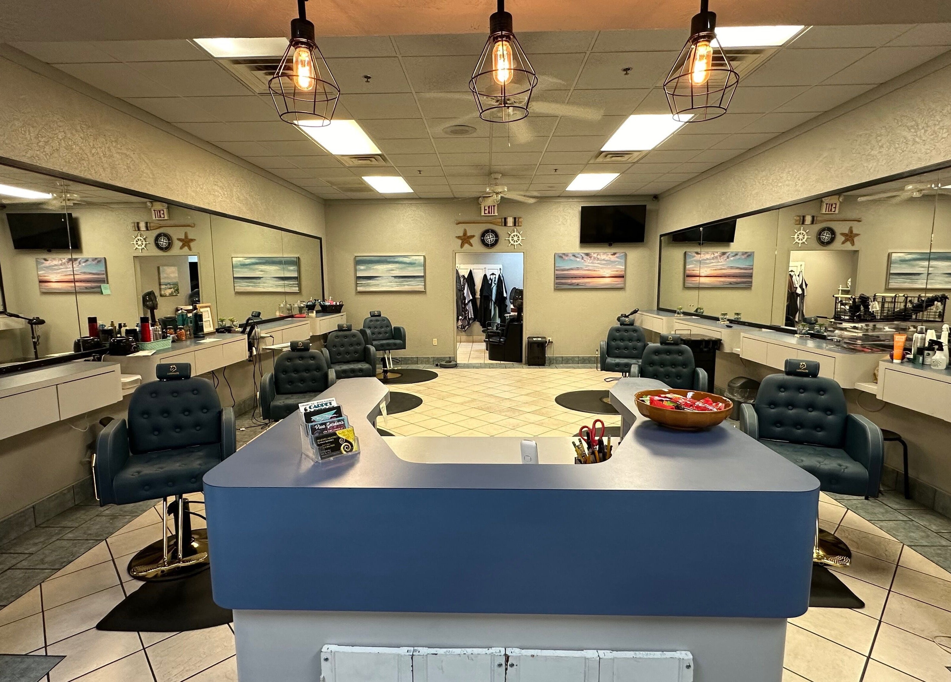 Interior of The Wave Salon, Broken Arrow, Oklahoma, US showcasing stylish styling stations and elegant decor.
