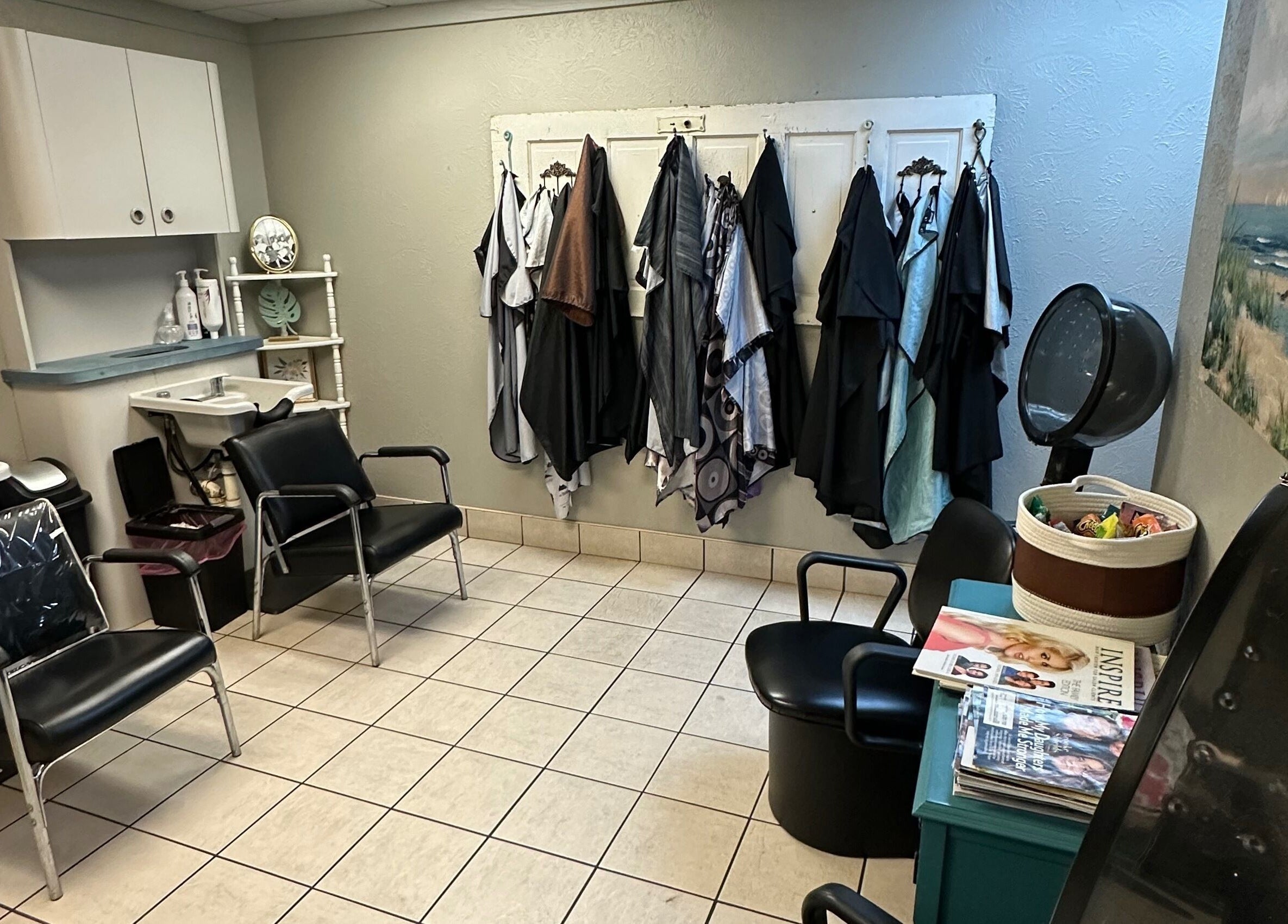 Relaxing seating and capes at The Wave Salon in Broken Arrow, Oklahoma, US.