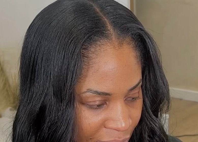 Stylish sleek hair at M London Studios, Barking, England, GB, showcasing expert styling and elegance.