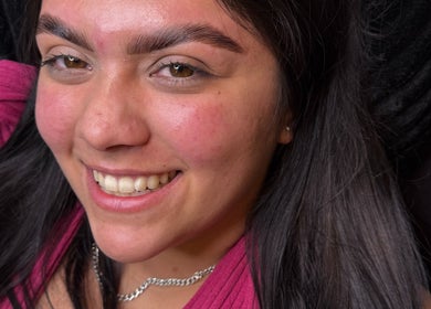 Smiling woman relaxing at Gely Precious in Colorado Springs, Colorado, US.