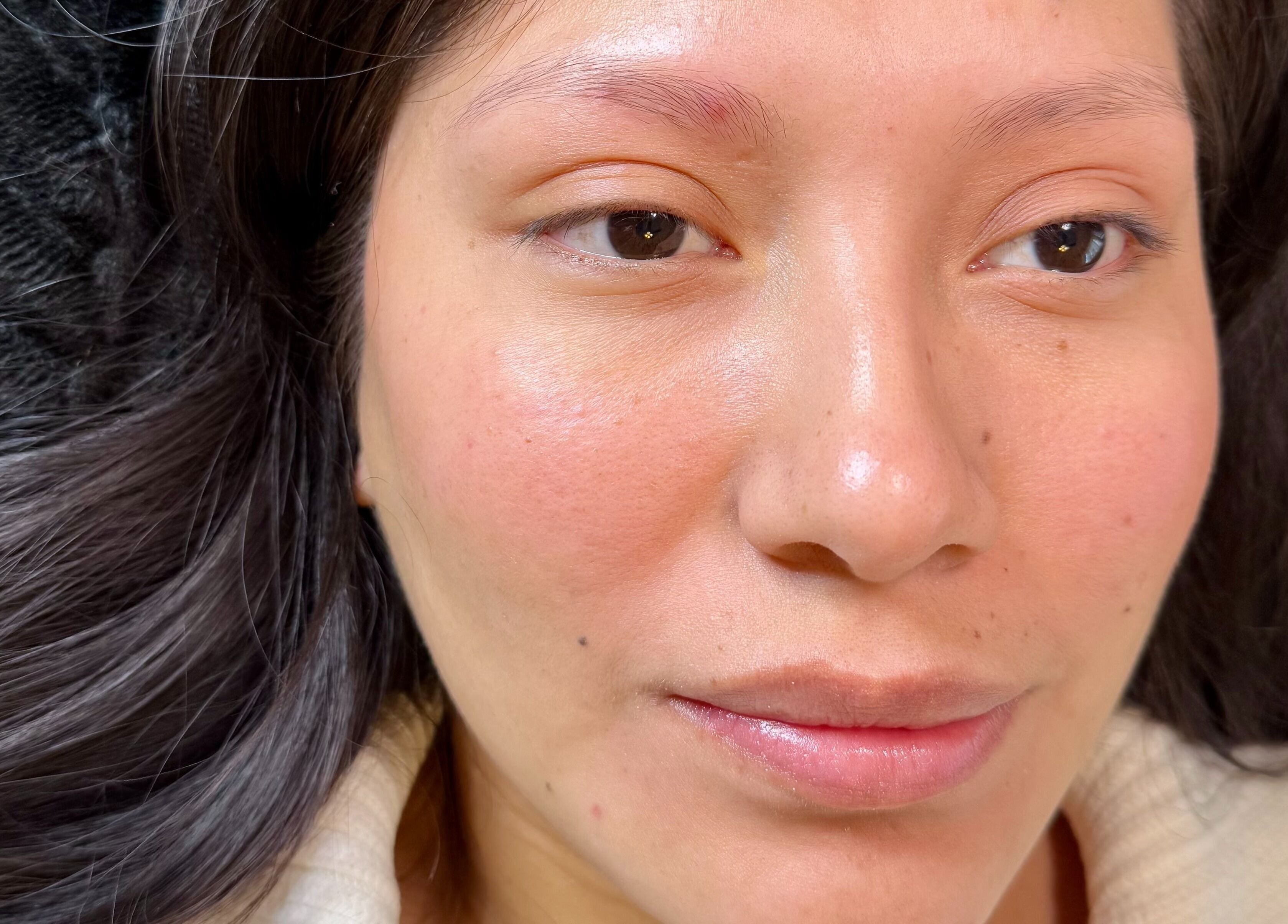 Close-up of a serene face with glowing skin at Gely Precious, Colorado Springs, Colorado, US.