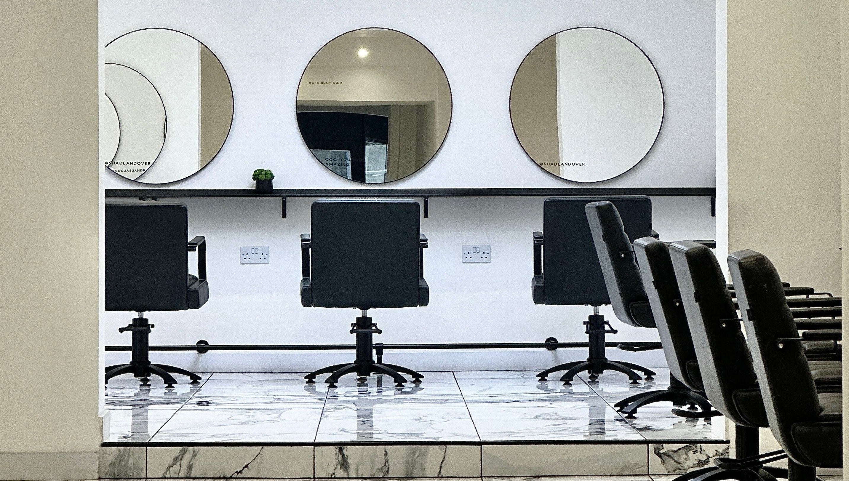 Elegant salon chairs and mirrors at SHADE ANDOVER, Andover, England, GB offer a modern beauty experience.