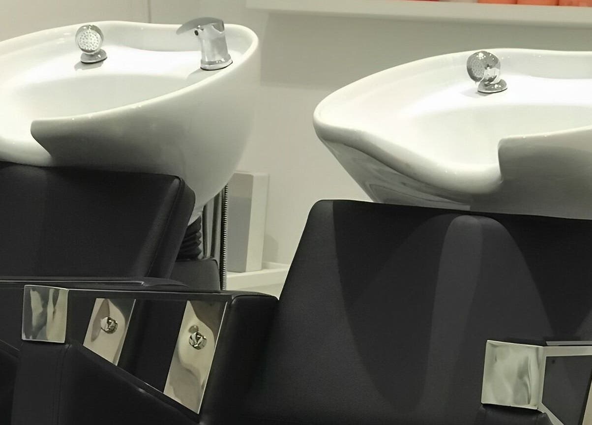 Modern wash stations at SHADE ANDOVER, Andover, England, GB, offering luxurious salon experiences.