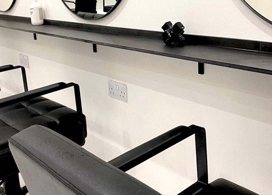 Modern salon chairs and mirrors at SHADE ANDOVER in Andover, England, GB.