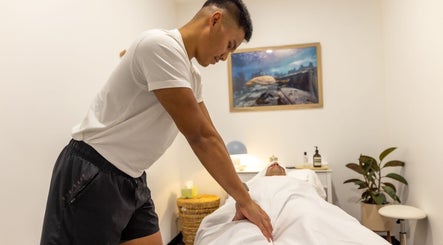 Therapist performs a massage at Kazspace in Sydney, Potts Point, New South Wales, AU.