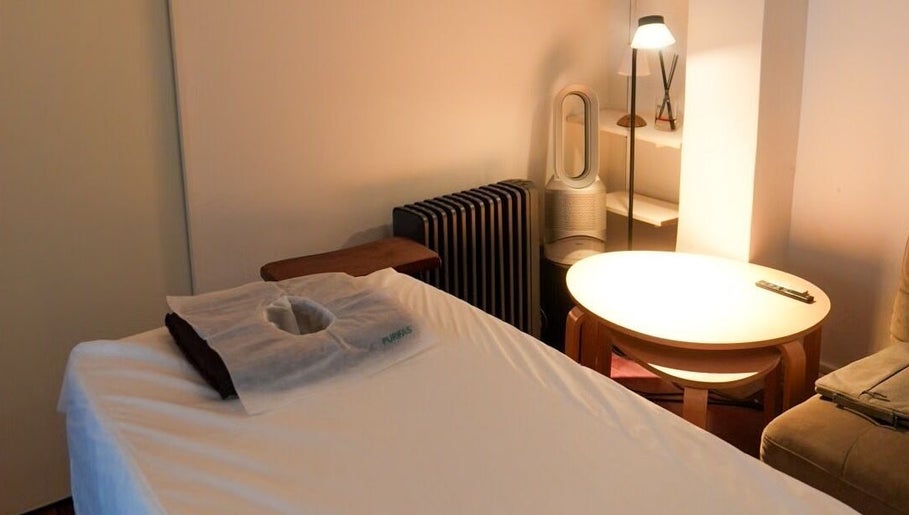 Comfortable spa room with massage table at Kazspace in Melbourne, Victoria, AU, perfect for relaxation.