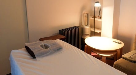Comfortable spa room with massage table at Kazspace in Melbourne, Victoria, AU, perfect for relaxation.