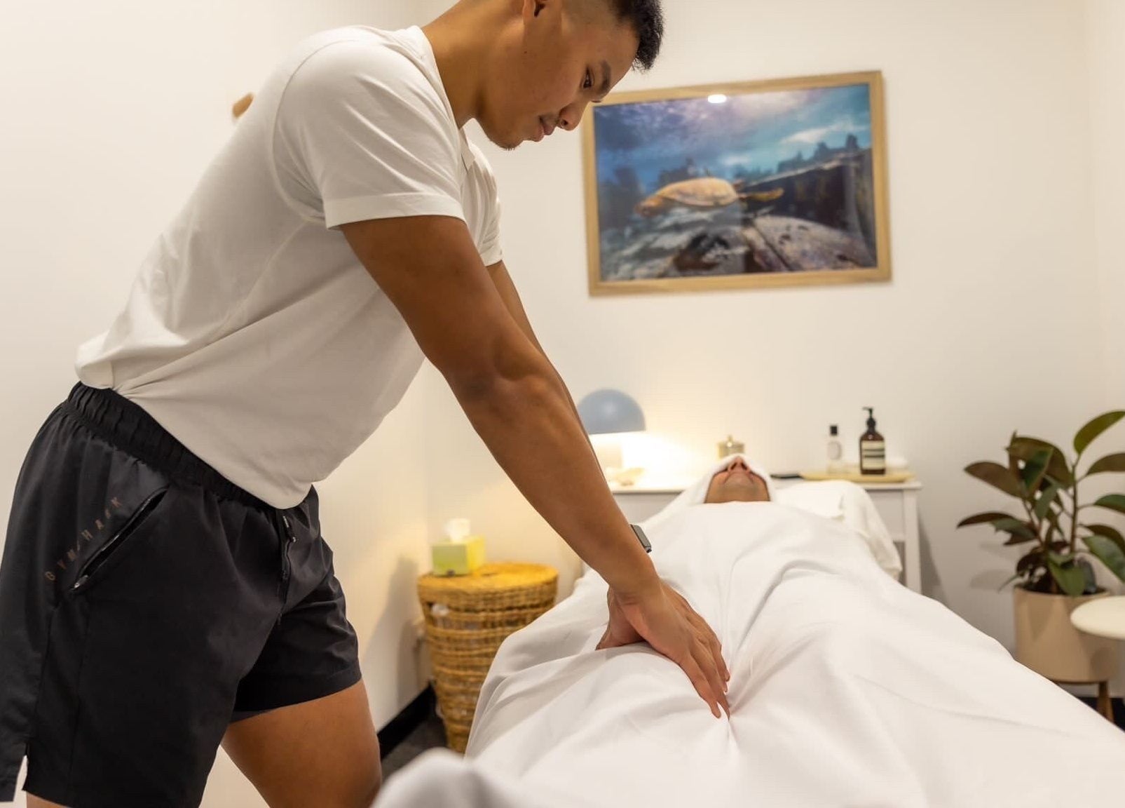 Relaxing massage session at Kazspace in Melbourne, Victoria, AU, highlighting serene and calming wellness ambiance.