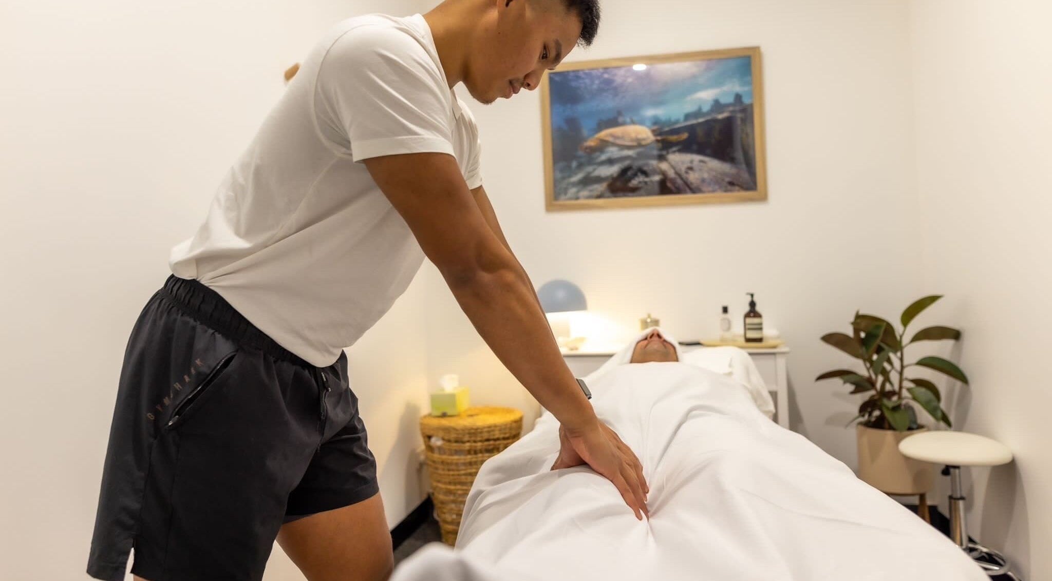 Relaxing massage session at Kazspace in Melbourne, Victoria, AU, highlighting serene and calming wellness ambiance.