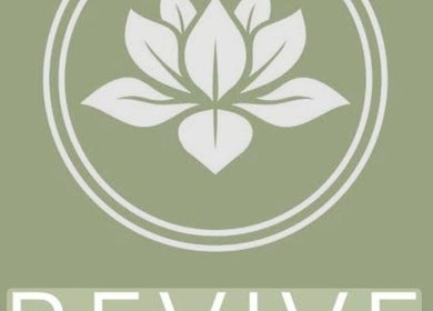 Logo of Katie Betty Laser & Aesthetics in Portsmouth, England, GB featuring a white lotus design.