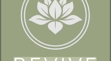 Logo of Katie Betty Laser & Aesthetics in Portsmouth, England, GB featuring a white lotus design.
