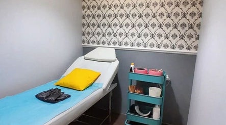 Justwax PIK's serene room shows a comfy bed, bright decor. Daerah Khusus Ibukota Jakarta, Daerah Khusus Ibukota Jakarta, ID.