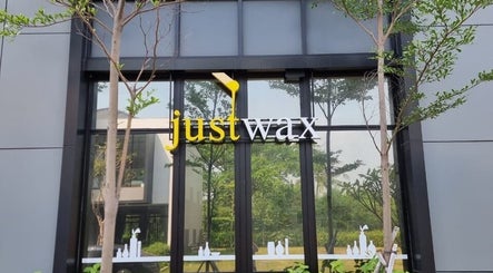 Justwax PIK exterior with clear signage, located in Daerah Khusus Ibukota Jakarta, ID.