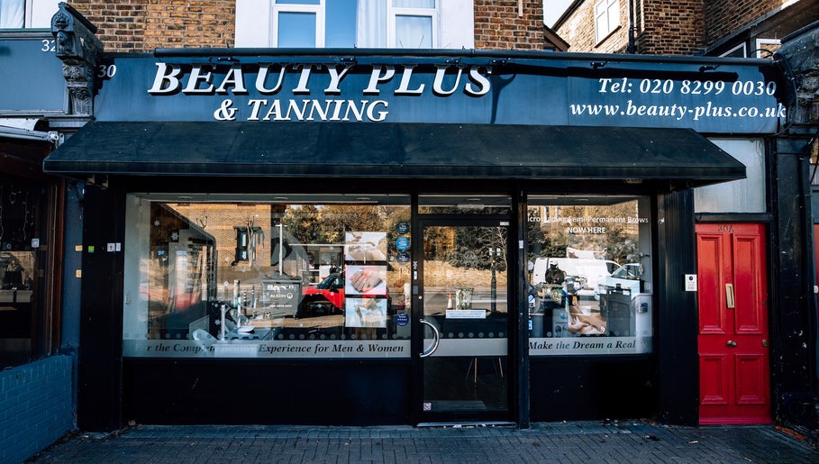Street view of Beauty Plus entrance in London, England, GB with stylish signage.
