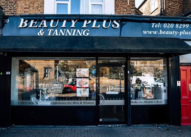Street view of Beauty Plus entrance in London, England, GB with stylish signage.