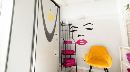 Modern beauty space at Beauty Plus, London, England, GB with vibrant decor and stylish furnishings.