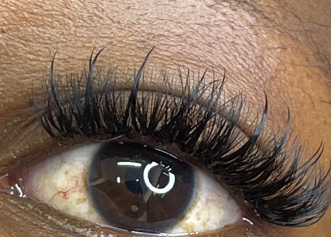 Close-up of precisely applied eyelashes at Belle B Luxe studio, Roodepoort, Gauteng, ZA.