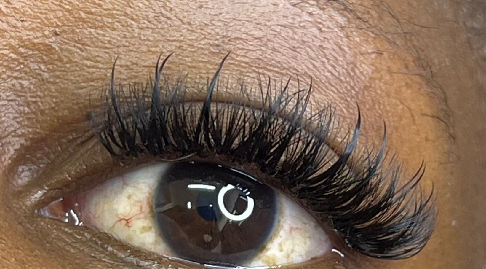 Close-up of precisely applied eyelashes at Belle B Luxe studio, Roodepoort, Gauteng, ZA.