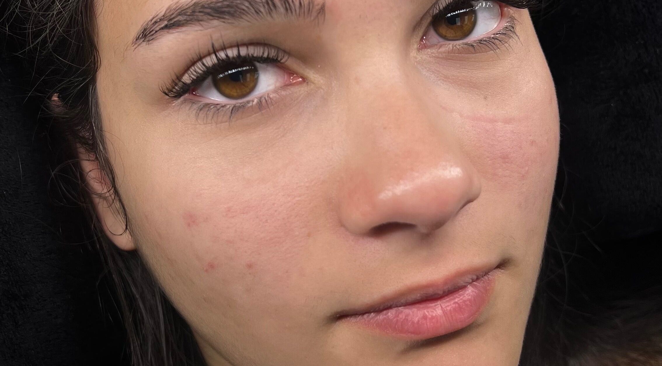 Detailed close-up of a woman’s face showcasing natural beauty at Belle B Luxe studio, Roodepoort, Gauteng, ZA.