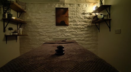 Relaxing spa room at Mirror Mirror Bingley, Bingley, England, GB, featuring a massage table and soothing decor.
