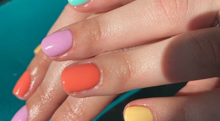 Colorful manicure at Powder Beauty At Duke House, Brighton, England, GB showcasing pastel nails.