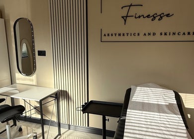 Treatment room at Finesse Aesthetics and Skincare, Burton-on-trent, England, GB with modern decor and a relaxing atmosphere.