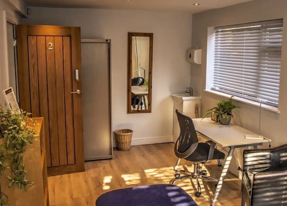 Calming consultation room at Crystal Clear Hearing, Burton Upon Trent, England, GB, featuring a cozy setup.