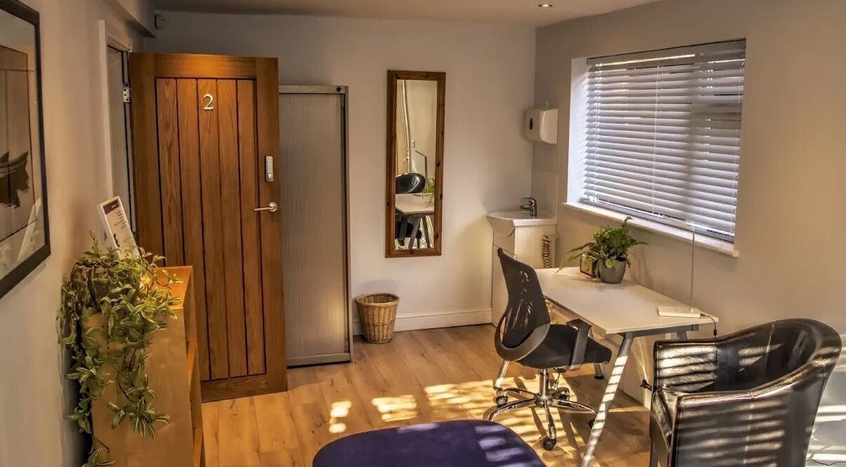 Calming consultation room at Crystal Clear Hearing, Burton Upon Trent, England, GB, featuring a cozy setup.