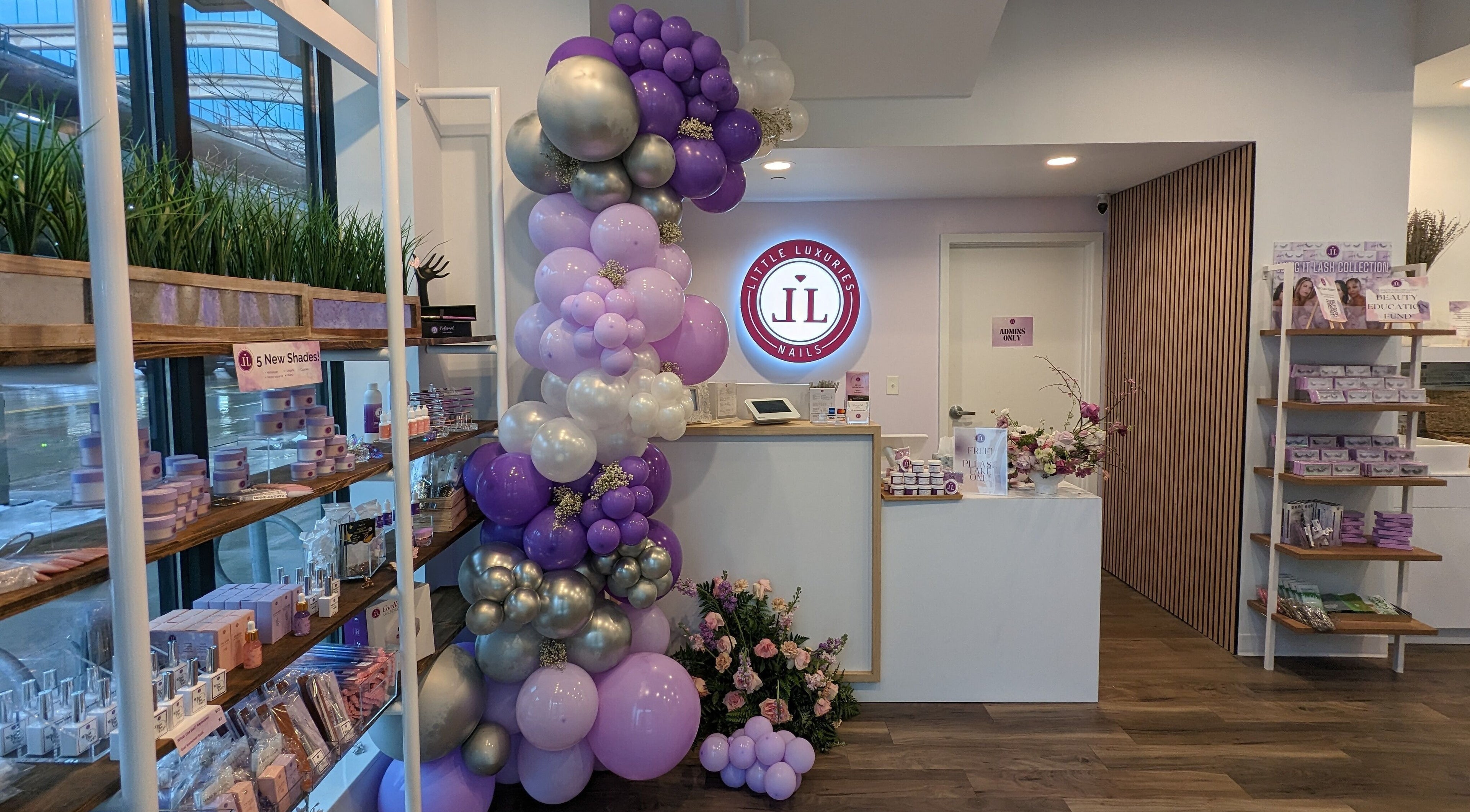 Beautiful entrance of Little Luxuries Nails in Minneapolis, Minnesota, US with elegant decor.